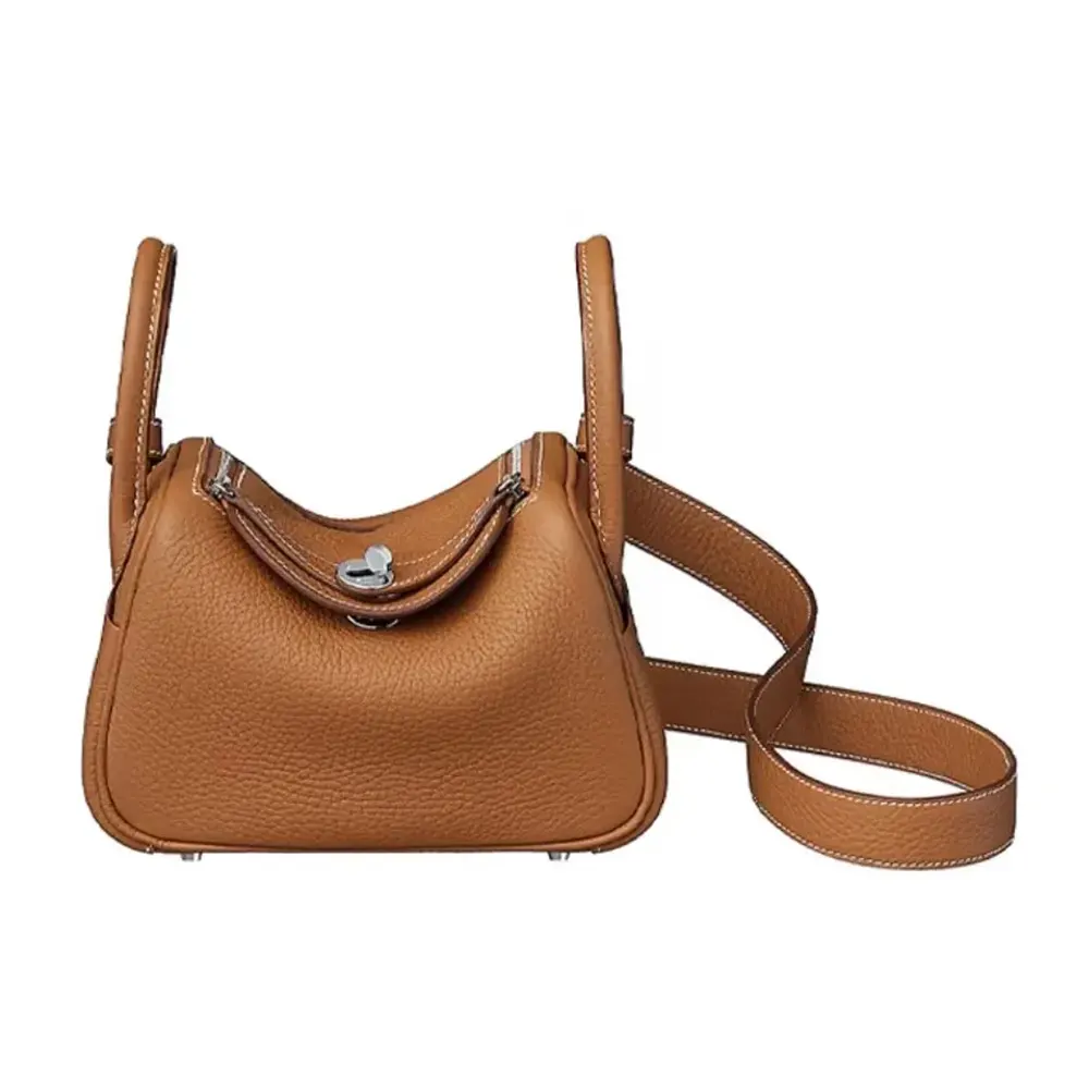 Front view of Hermes Women Lindy Mini 19 in Brown Clemence Leather with silver hardware