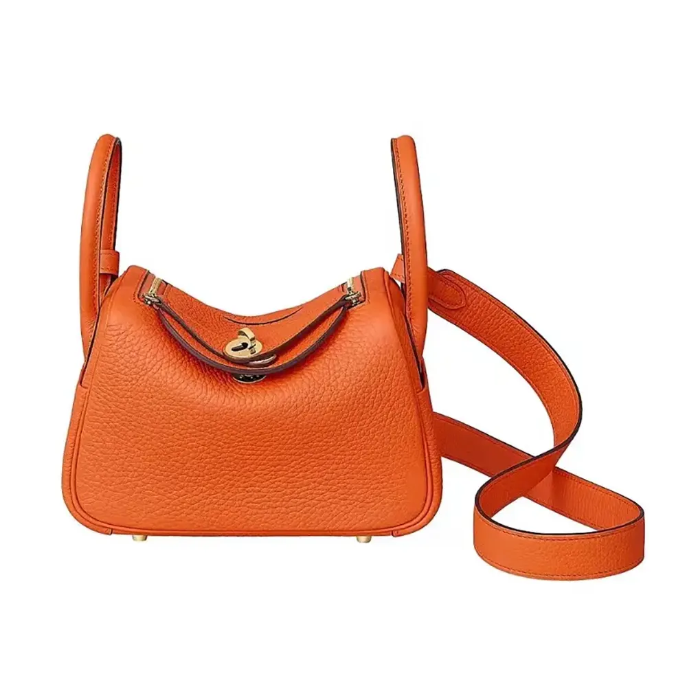 Front view of Hermes Women Lindy Mini 19 in orange Clemence leather