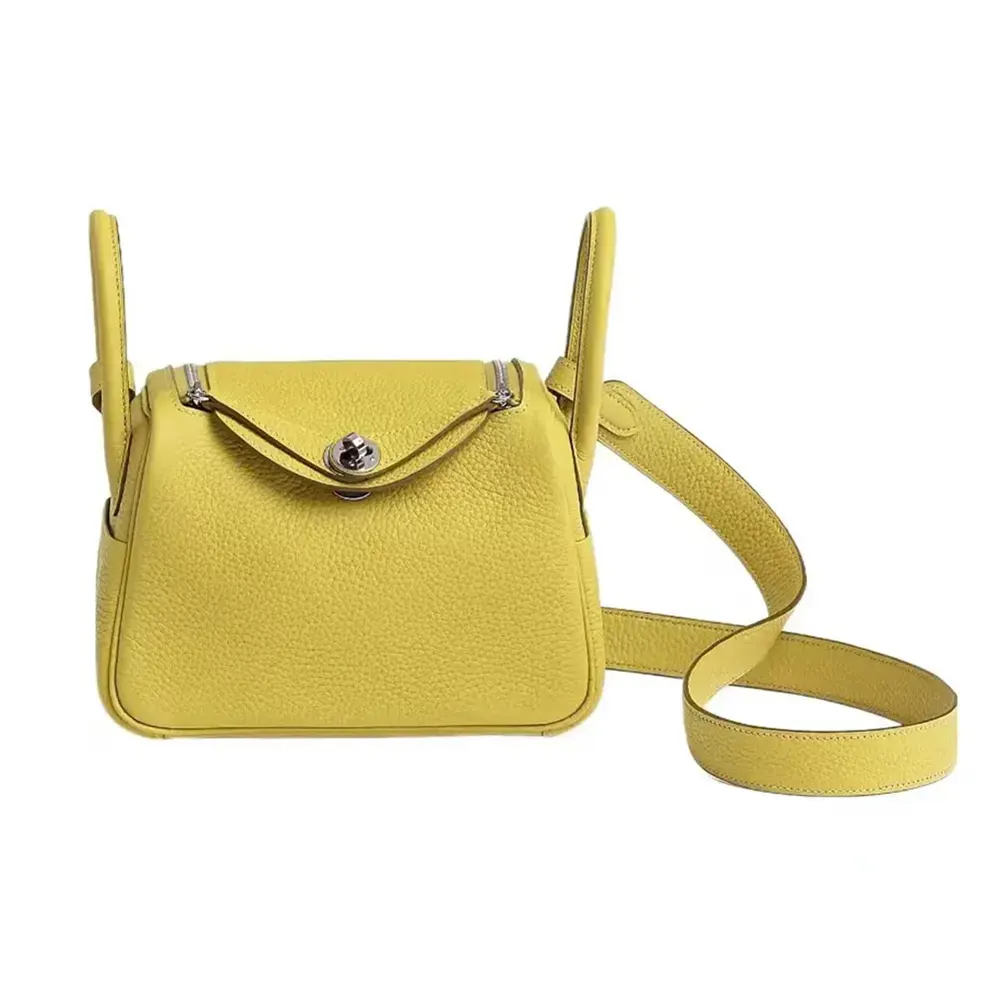 Front view of Hermes Women Lindy Mini 19 yellow clemence leather bag