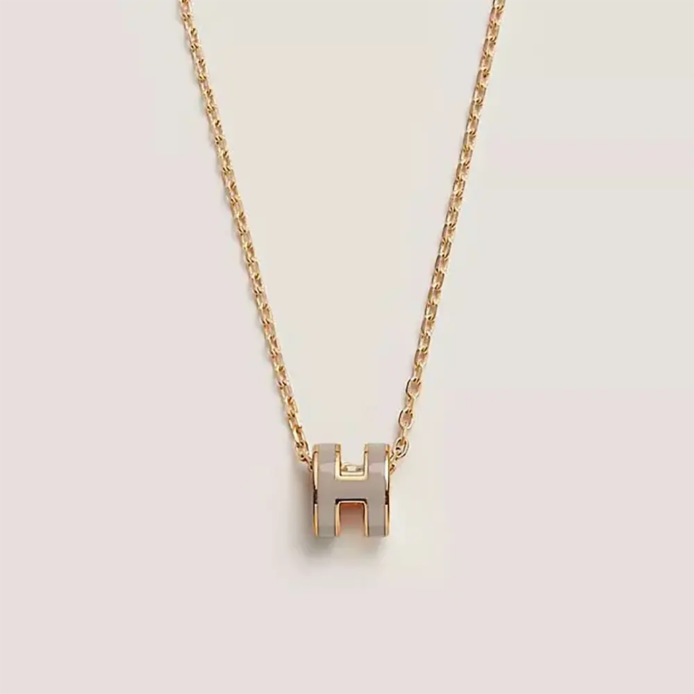 Front view of Hermes Women Mini Pop H Pendant-Gray with signature H hardware