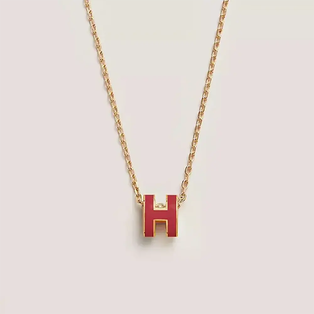 Close-up of Hermes Women Mini Pop H Pendant-Red showing enamel detail