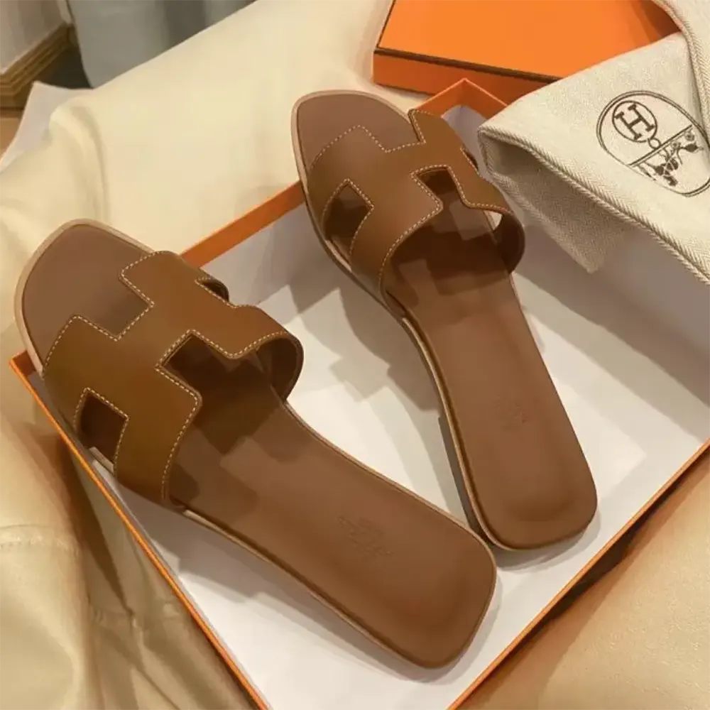 Top-down view of Hermes Women Oran Sandal-Brown with cushioned footbed