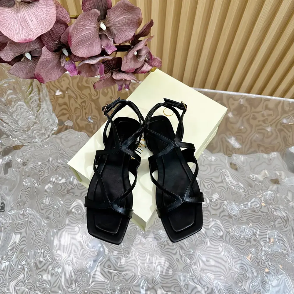 Close-up of black nappa leather texture on Jimmy Choo Ayla Flats