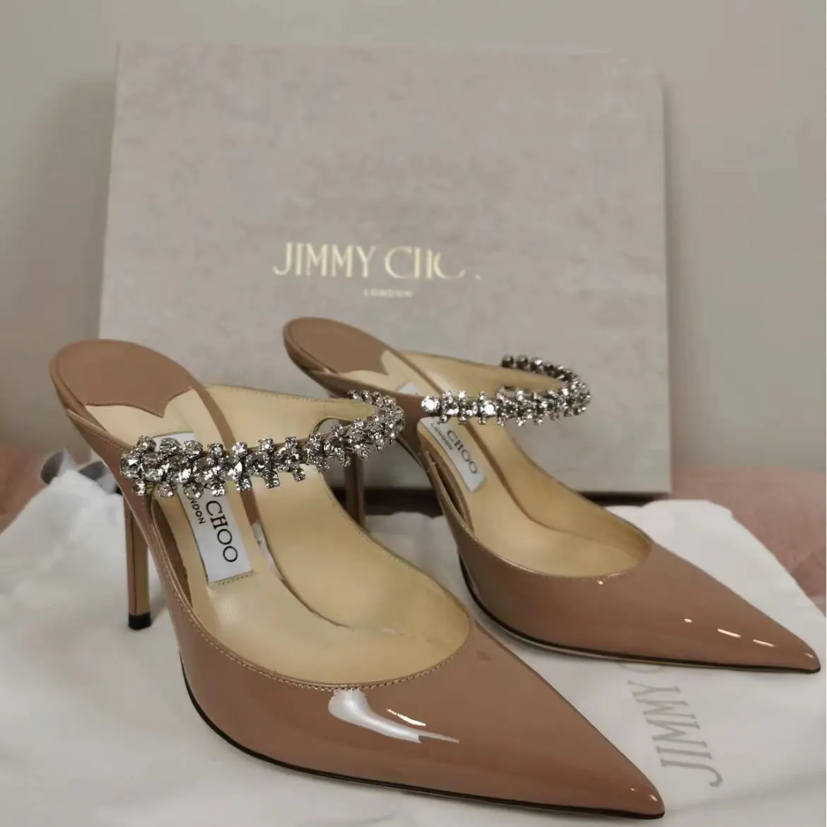 Close-up detail of crystal embellishments on Jimmy Choo Bing mules