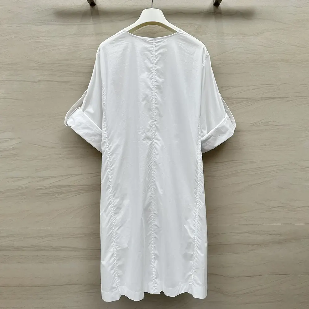 Side angle showing silhouette of Loewe Women Pebble Dress in Cotton-White