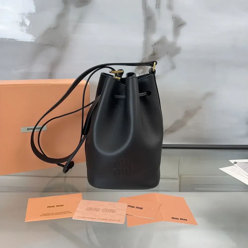 Close-up of silver hardware on Miu Miu Women Leather Bucket Bag-Black