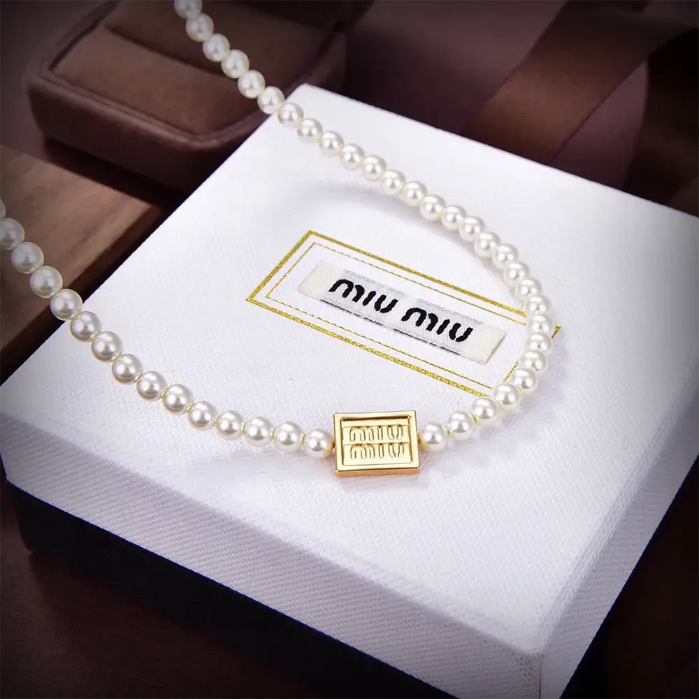 Side angle showing adjustable length and pearl texture on Miu Miu choker