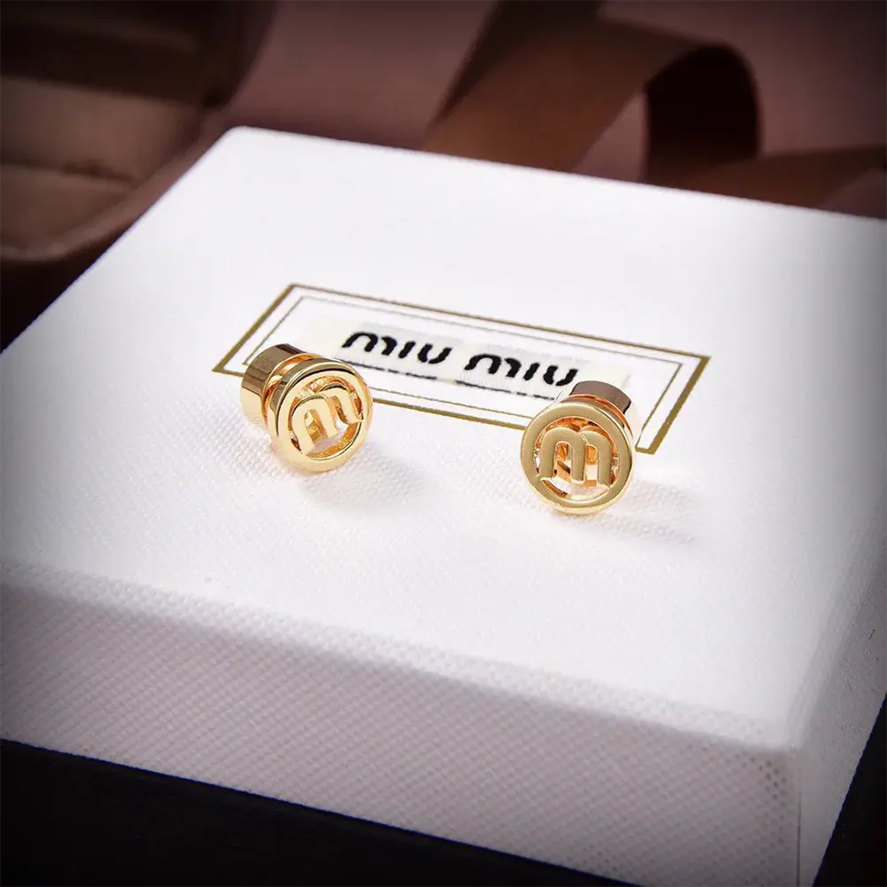 Side angle showing the clasp detail of Miu Miu Women Metal Earrings