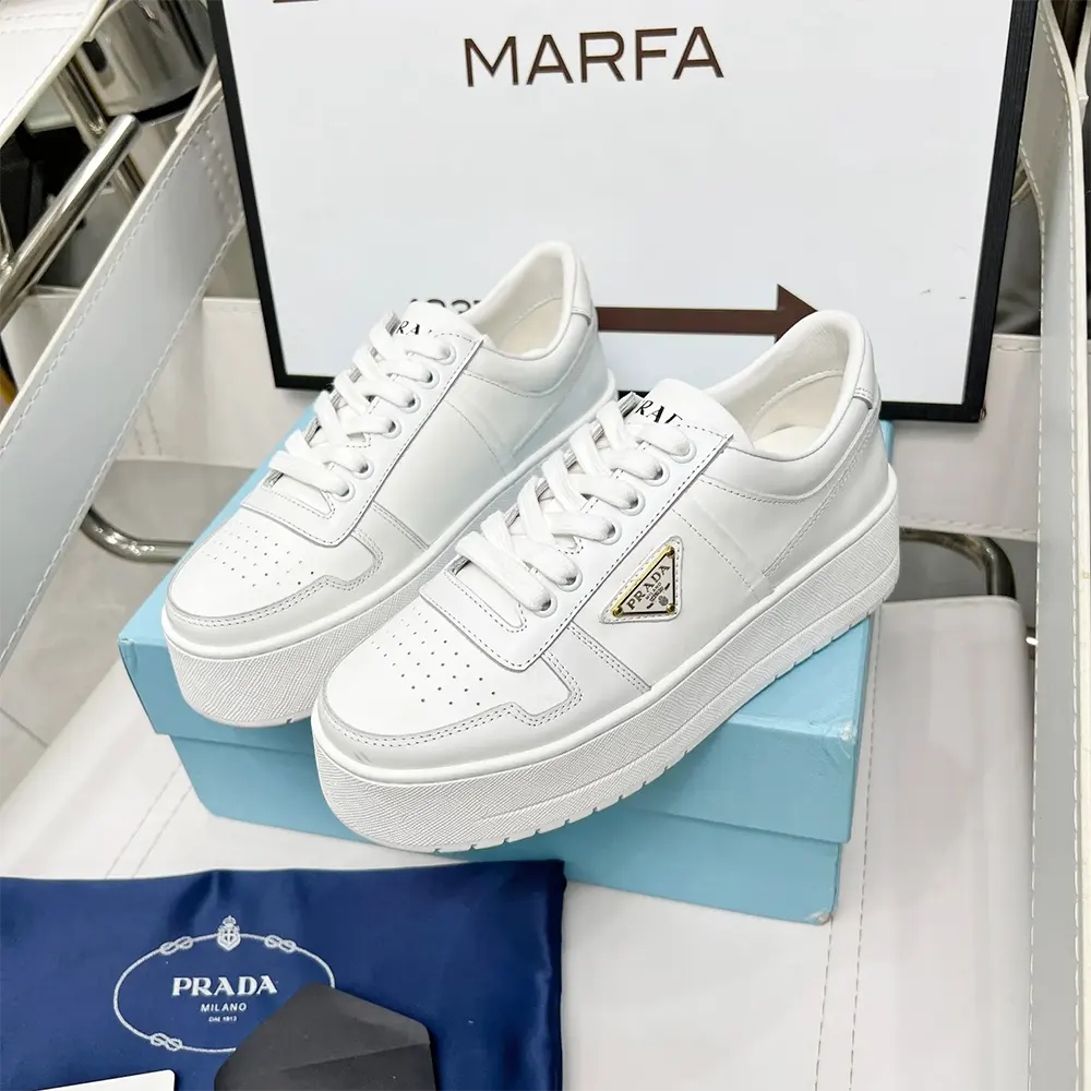 Top-down angle showing lace-up closure on Prada Women Downtown Bold Leather Sneakers