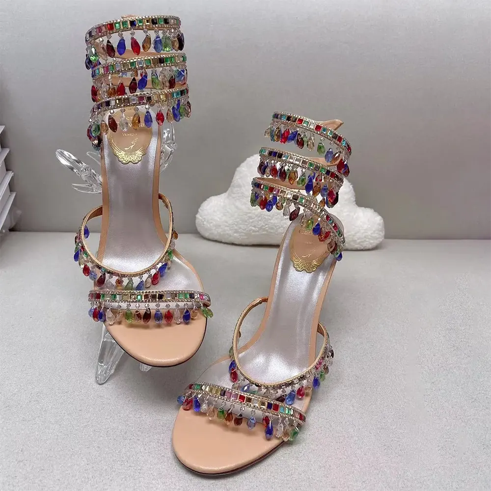Close-up of crystal chandelier detail on Rene Caovilla Women Chandelier Crystal Sandy Sandal 105