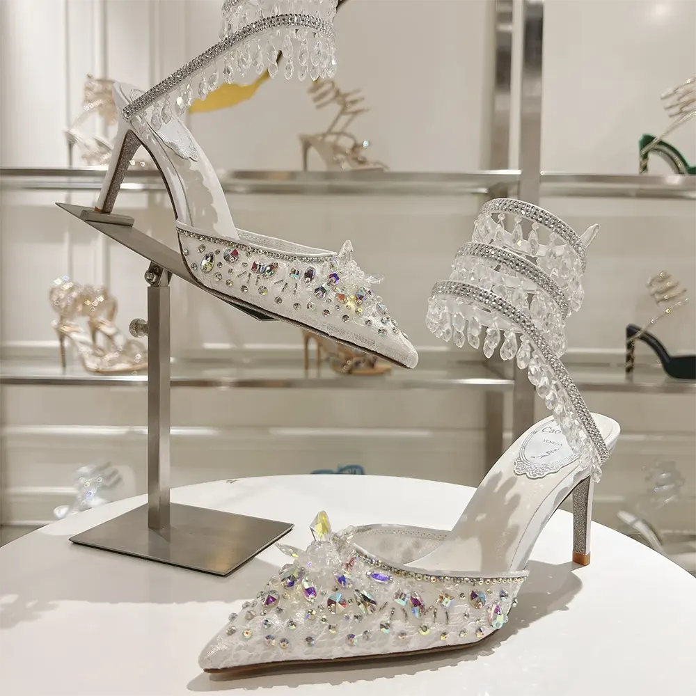 Close-up of crystal embellishments on Rene Caovilla Women Chandelier White Pump 80