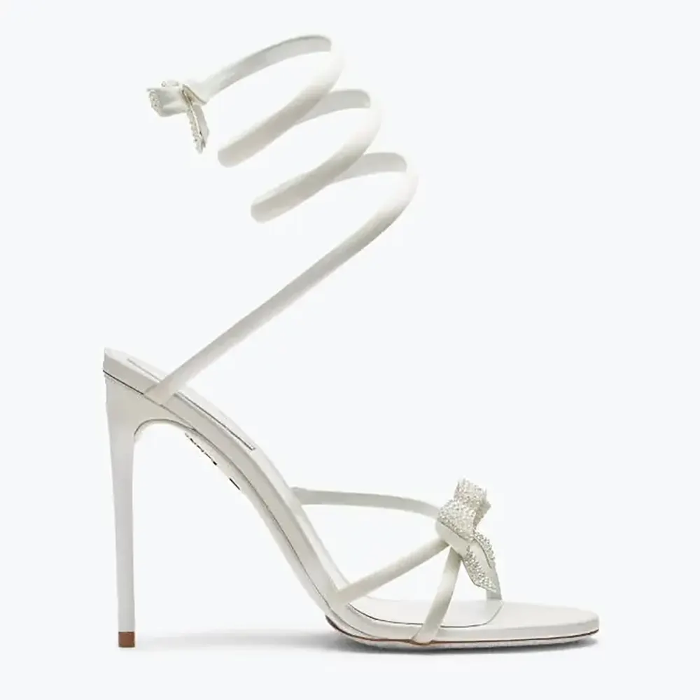 Side view of Rene Caovilla Women Cleo Ivory Sandal with Bows 105