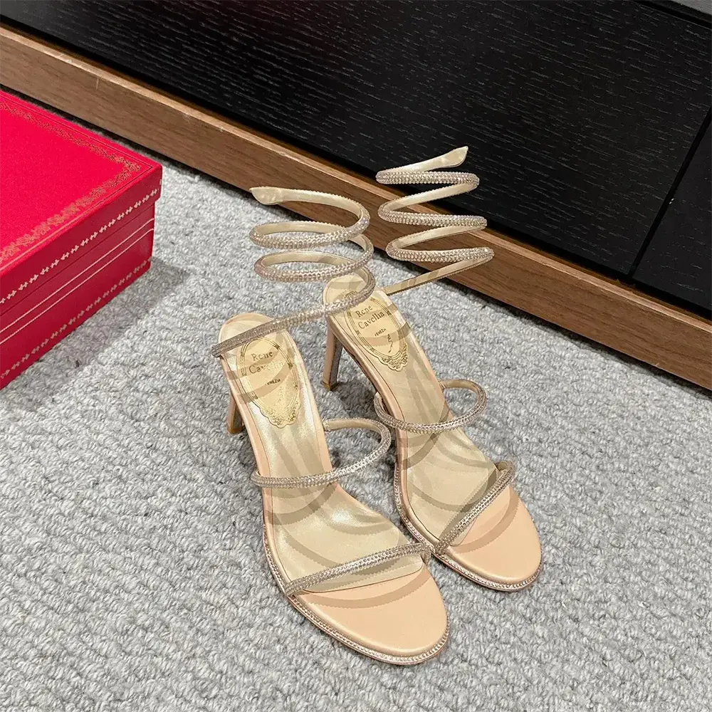 Close-up of crystal straps on Rene Caovilla Women Cleo Neutral Sandal 80