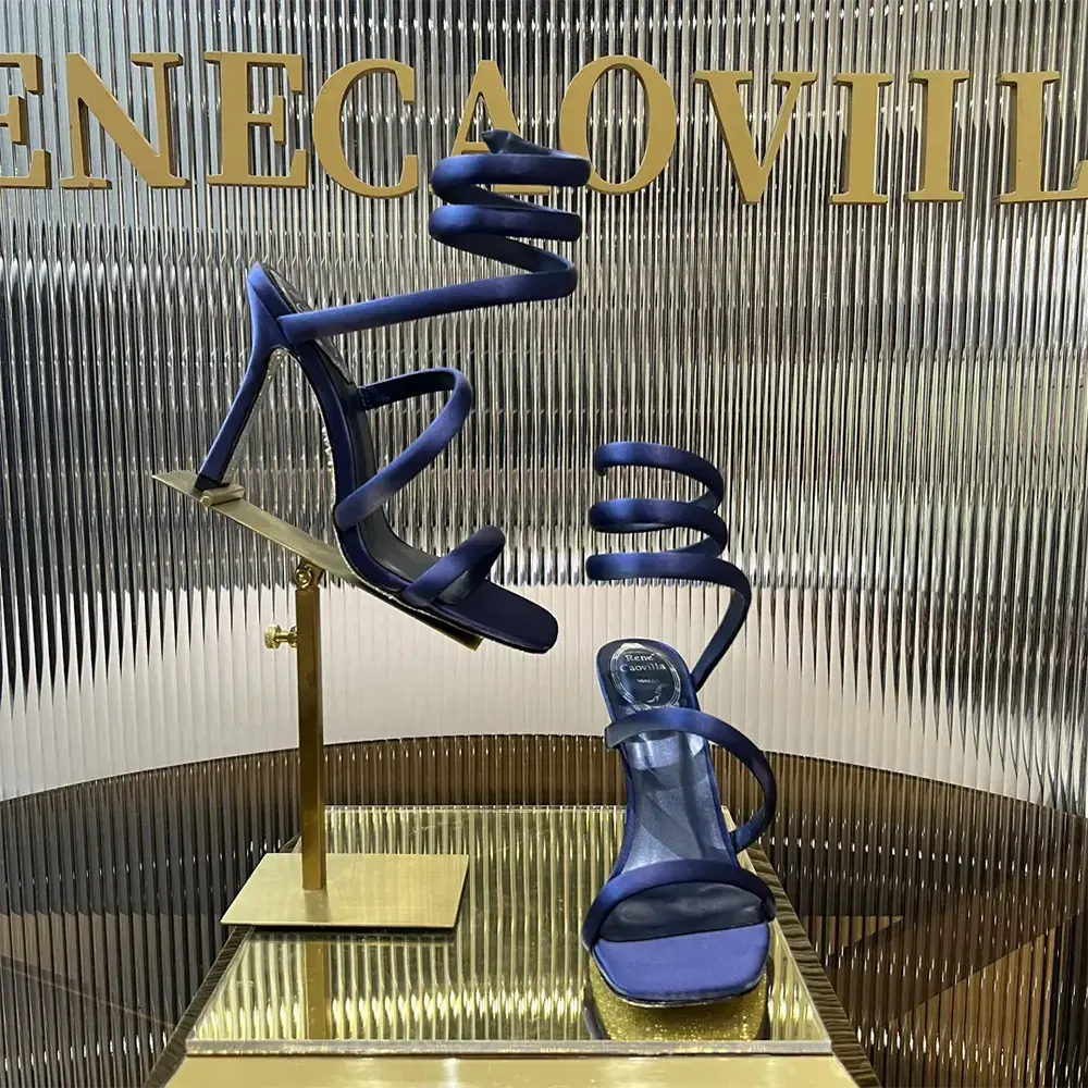 Close-up of crystal detailing on Rene Caovilla Cleopatra Midnight Blue Sandal