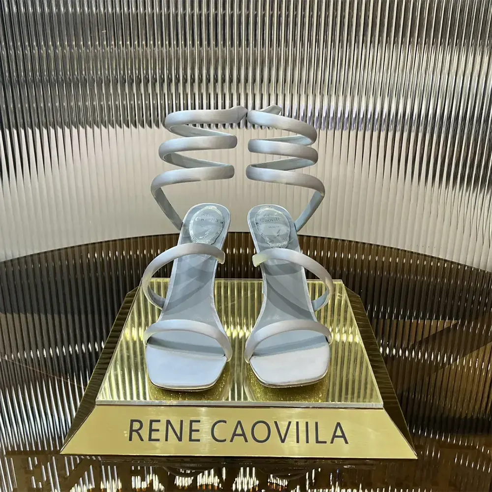 Close-up of crystal detailing on Rene Caovilla Women Cleopatra Silver Satin Sandal 105