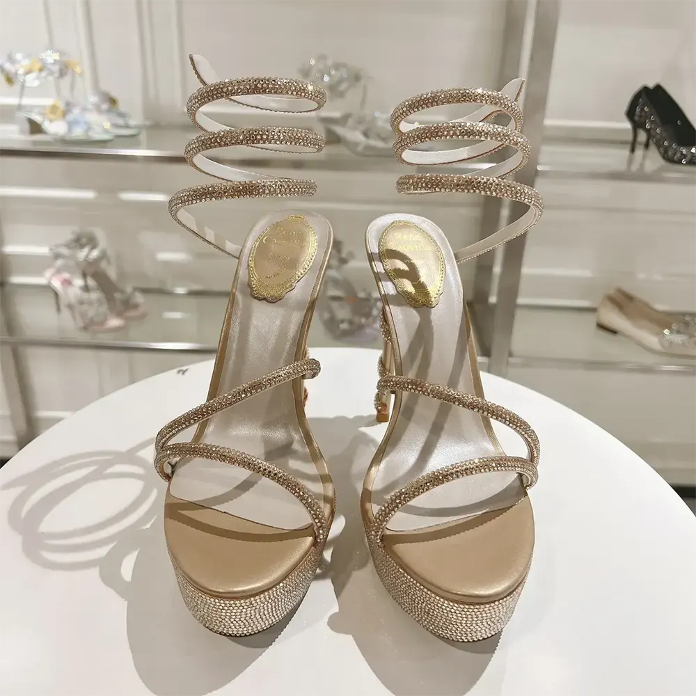 Close-up on crystal embellishments of Rene Caovilla Margot Beige sandal