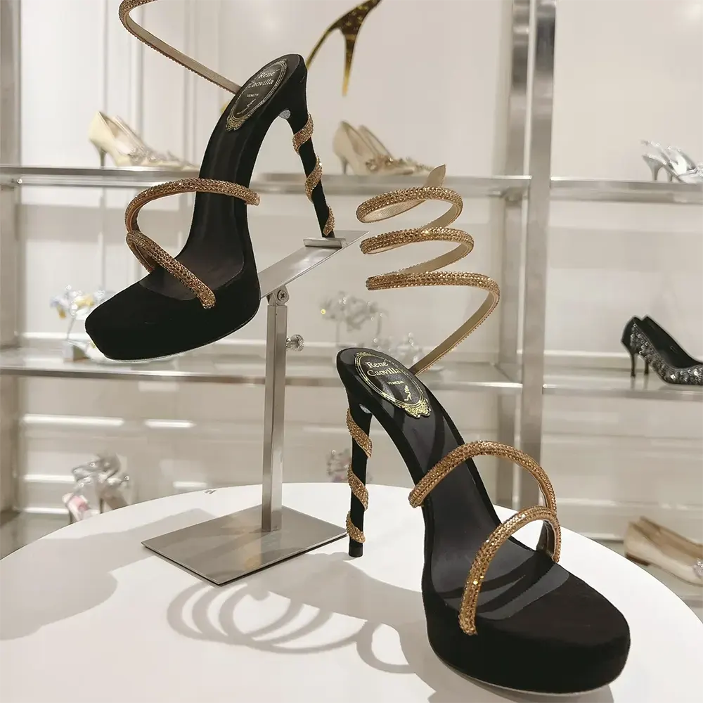 Back view showing black suede and gold hardware of Margot platform sandal