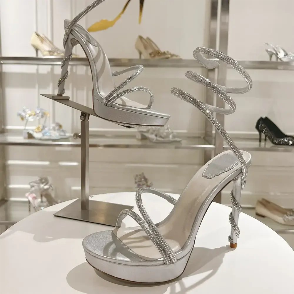 Close-up of crystal-embellished signature heel on Rene Caovilla Margot sandal