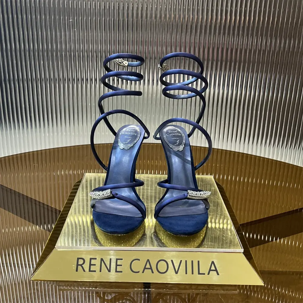 Close-up of crystal embellishments on Rene Caovilla Serpente Midnight Blue Sandal