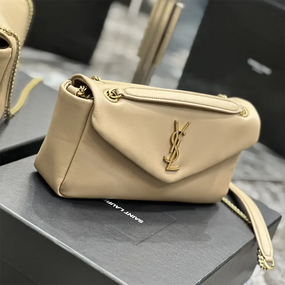 Side angle showing silhouette of Saint Laurent YSL Women Calypso in sandy lambskin