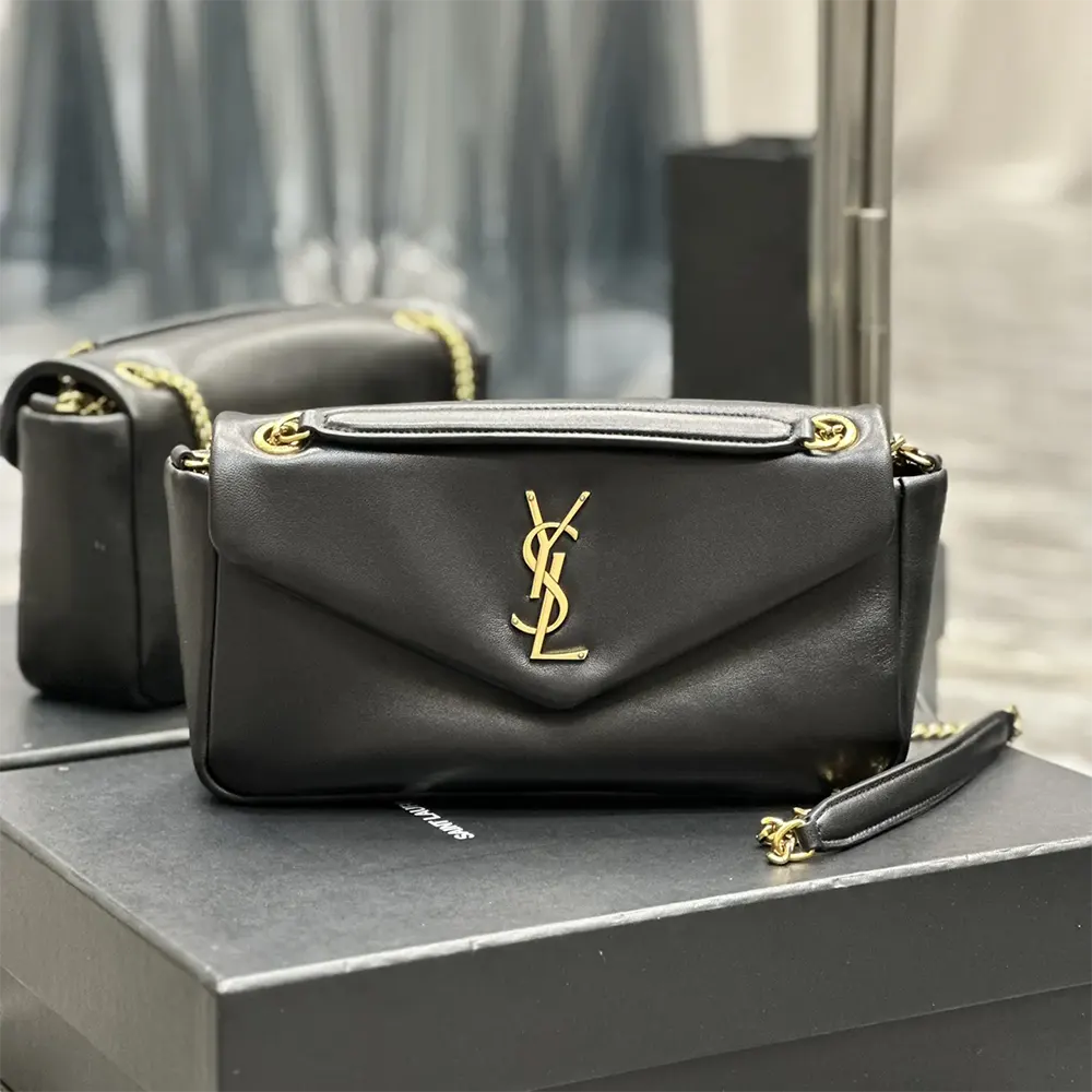 Close-up of gold YSL hardware on Calypso lambskin shoulder bag