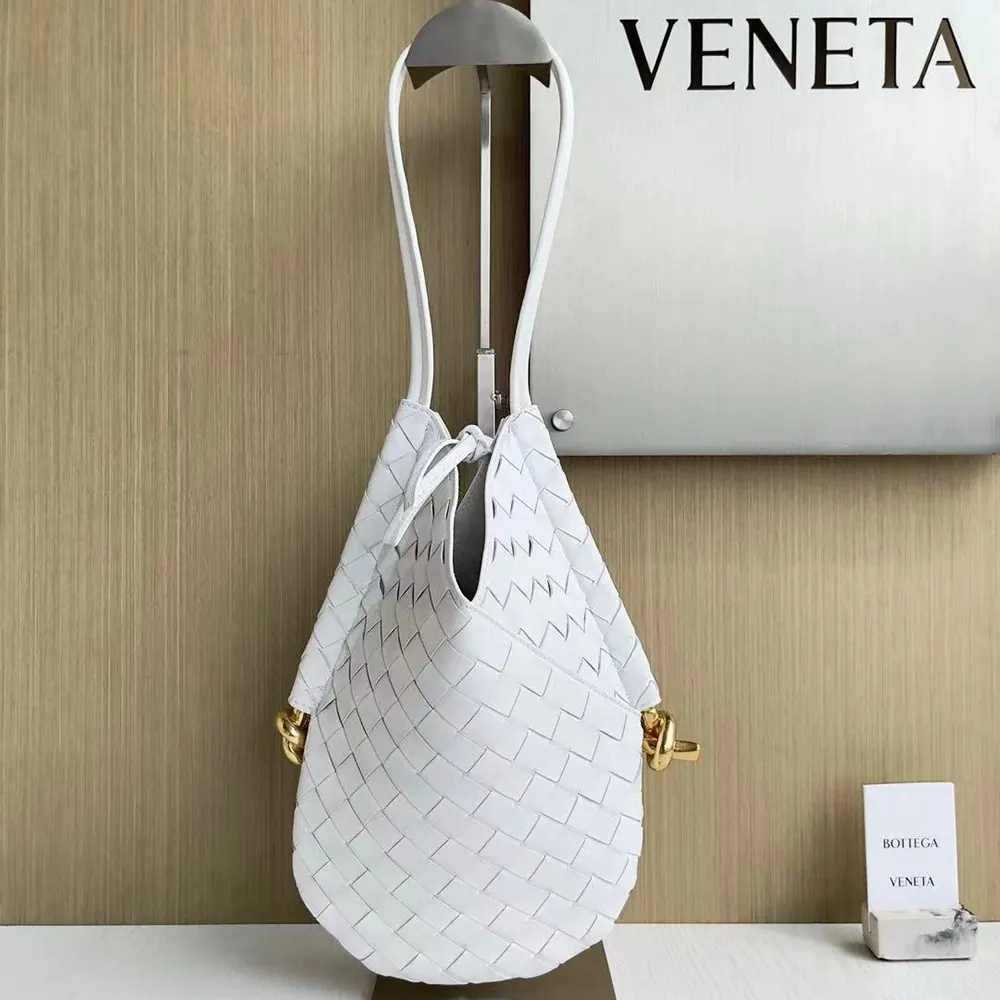 Close-up of intrecciato weave detail on Bottega Veneta small shoulder bag