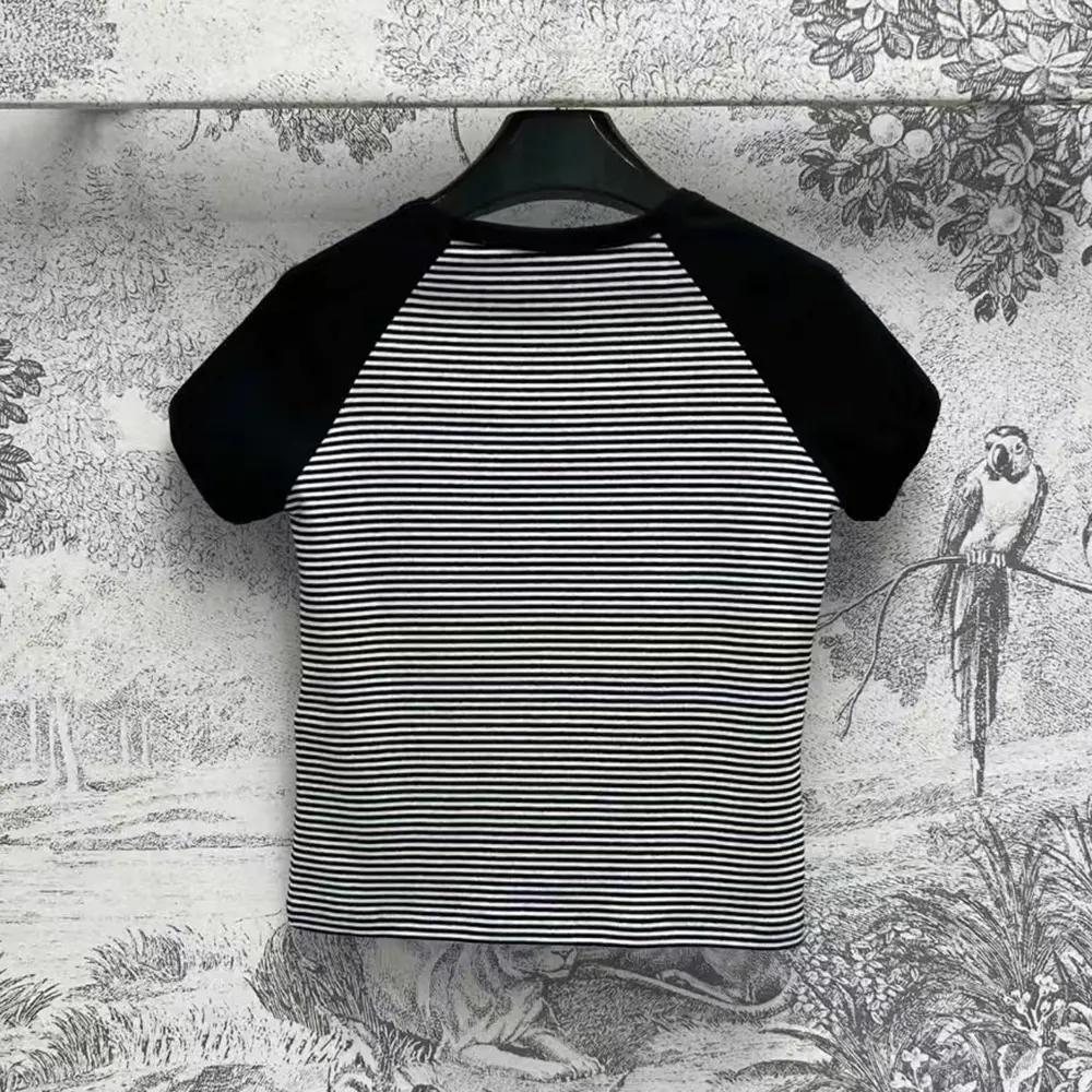 Side profile showing relaxed fit of Celine Women Triomphe T-shirt