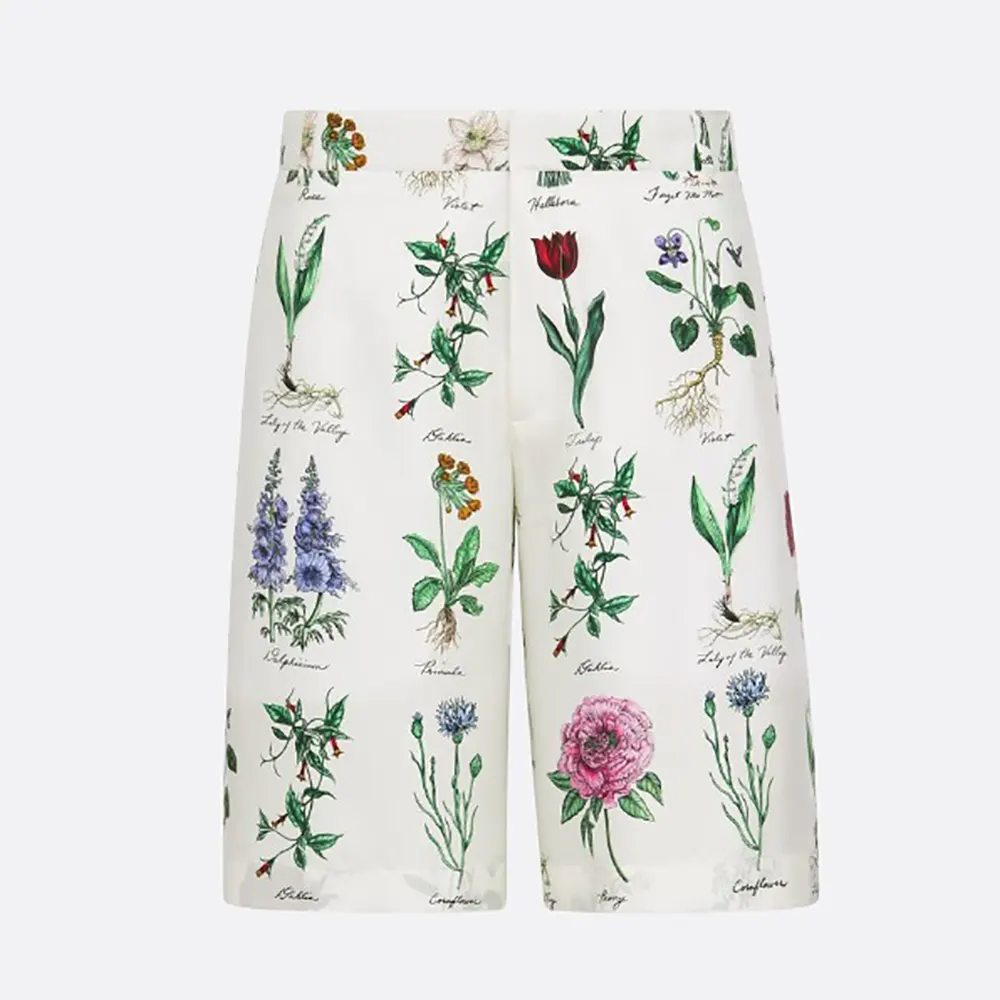 Front view of Dior Men Herbarium Illustration Bermuda Shorts in White Silk