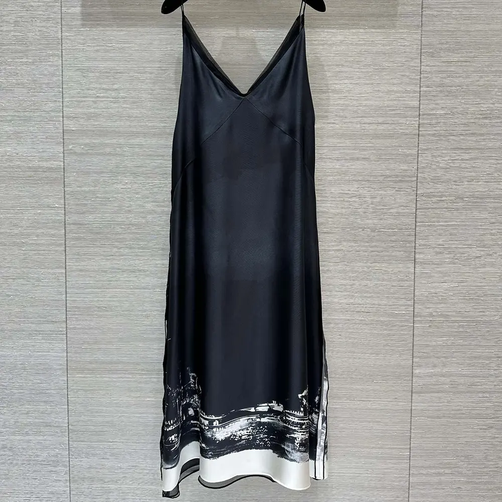 Side angle showing silhouette of Dior Women A-Line Mid-Length Dress Black and White Silk Twill