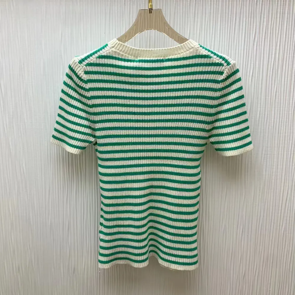 Side angle showcasing relaxed fit of Dior Women Dioriviera Short-Sleeved Sweater aqua knit