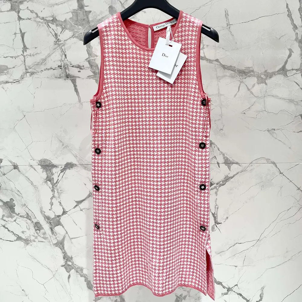 Close-up of candy pink and white houndstooth texture on Dioriviera dress