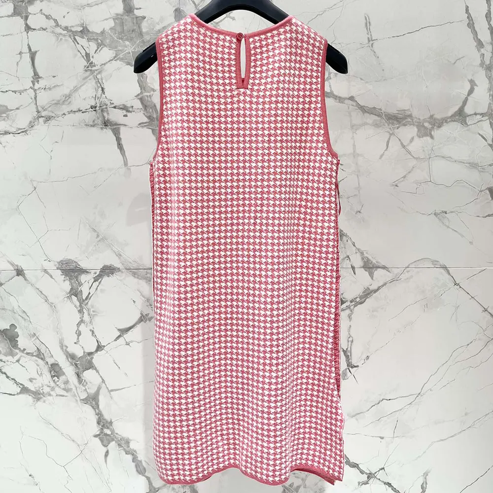 Side angle showcasing silhouette and knit details of Dior Women Dioriviera dress