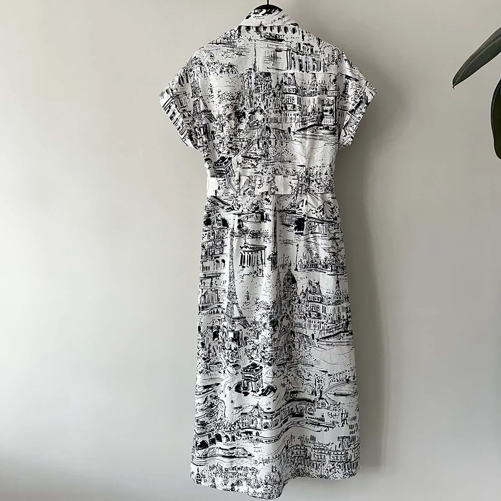 Side angle showing silhouette of Dior Women Mid-Length Shirt Dress White