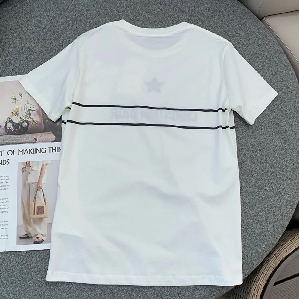 Side angle showing fit of Dior Women T-Shirt White Cotton Jersey with Signature