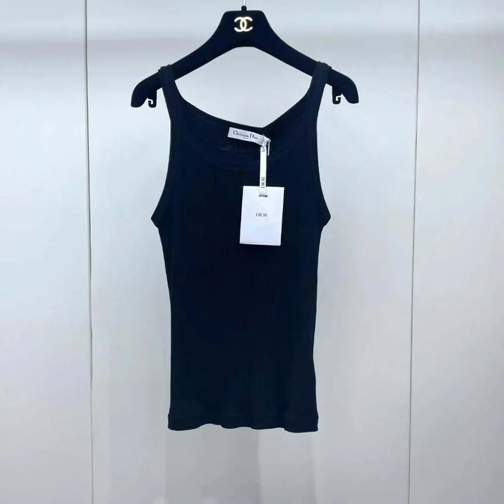 Close-up of ribbed texture and Dior logo on black tank top