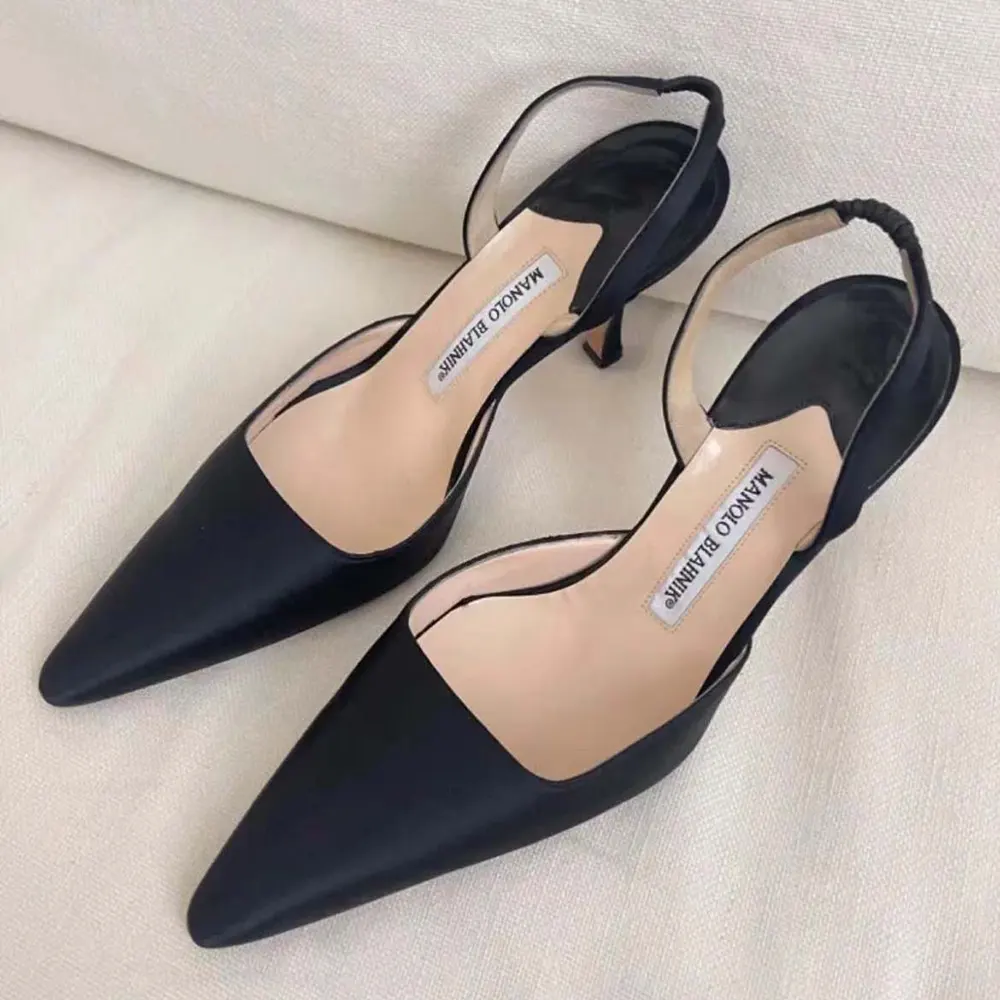 Rear view showcasing slingback strap on Manolo Blahnik Carolyne 70 pumps