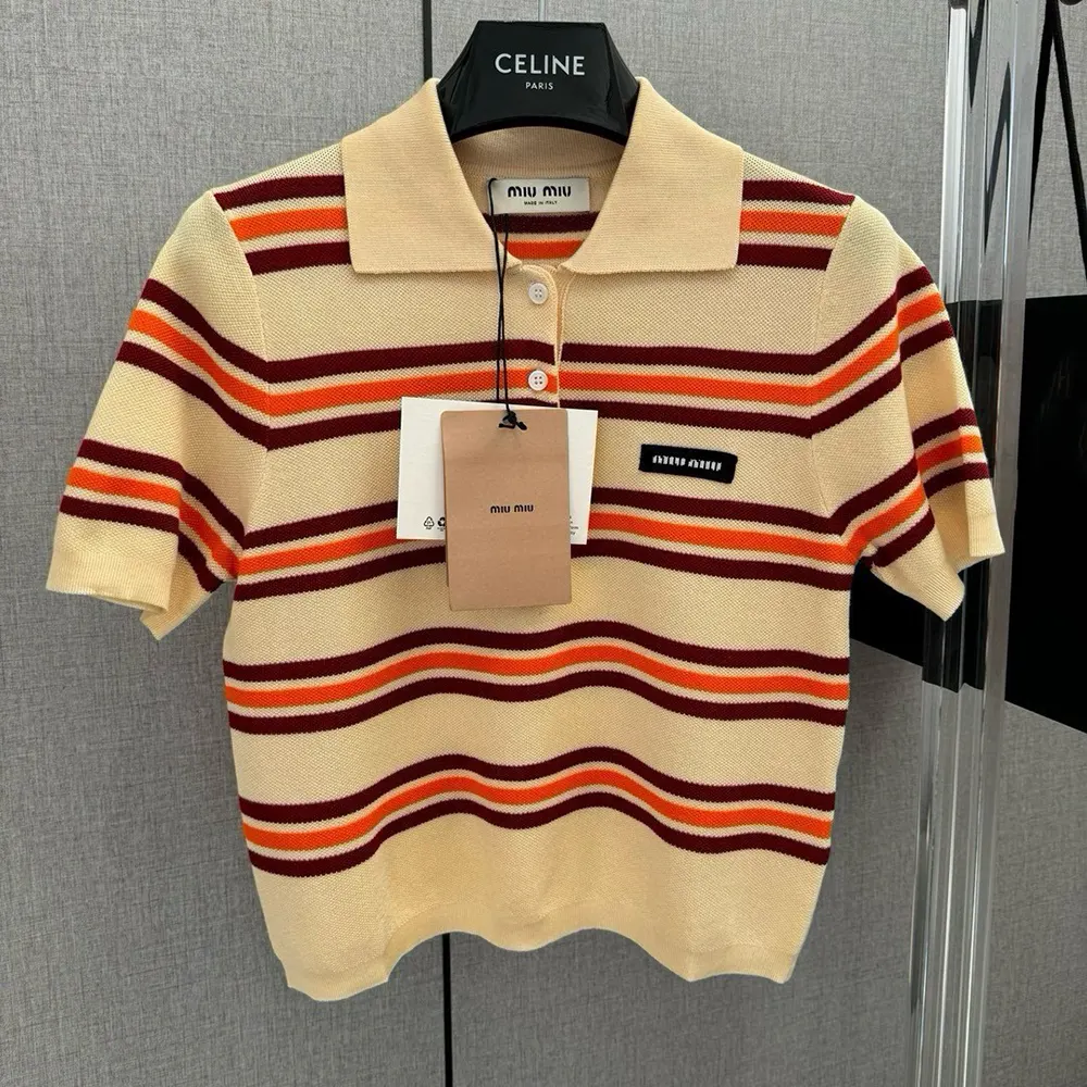 Close-up detail of ribbed collar on Miu Miu striped knit polo shirt