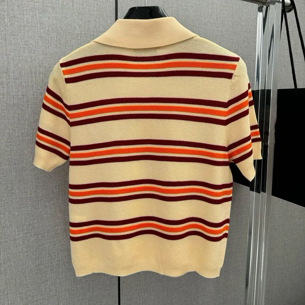 Side angle showing silhouette of Miu Miu Women Cotton Striped Knit Polo Shirt