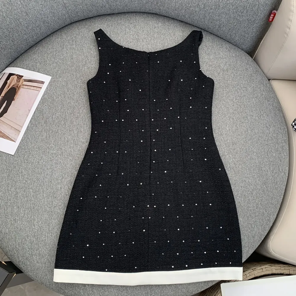 Side profile highlighting silhouette of Miu Miu Women Sequined Bouclé Mini-dress