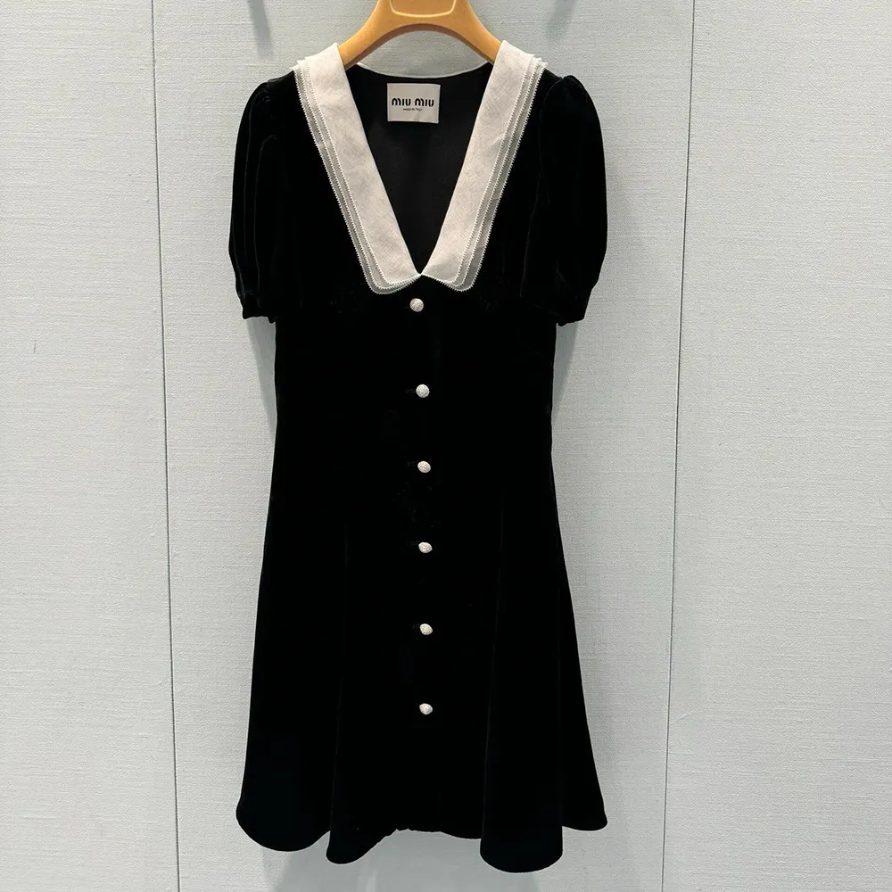 Close-up detail of black velvet texture on Miu Miu Women Velvet Minidress
