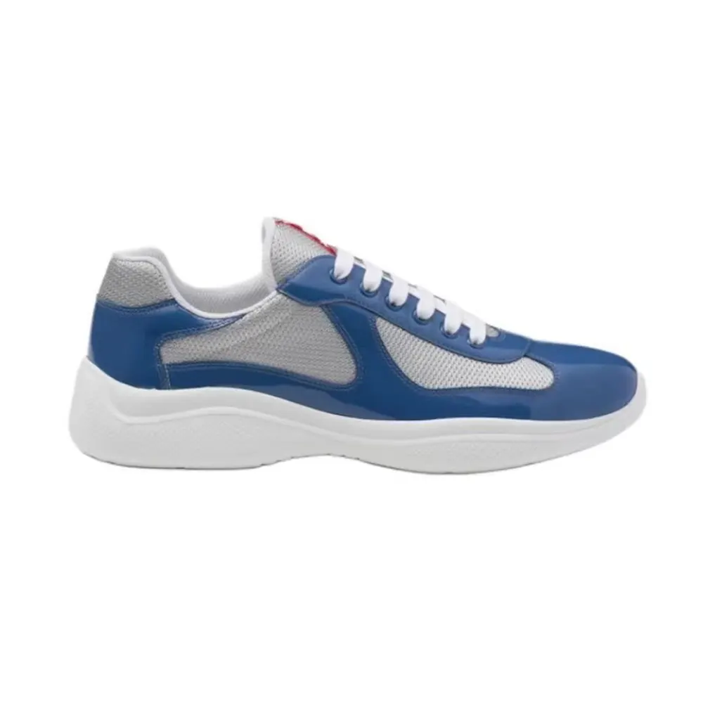 Side profile of Prada Unisex America’s Cup Soft Rubber and Bike Fabric Sneakers-Blue
