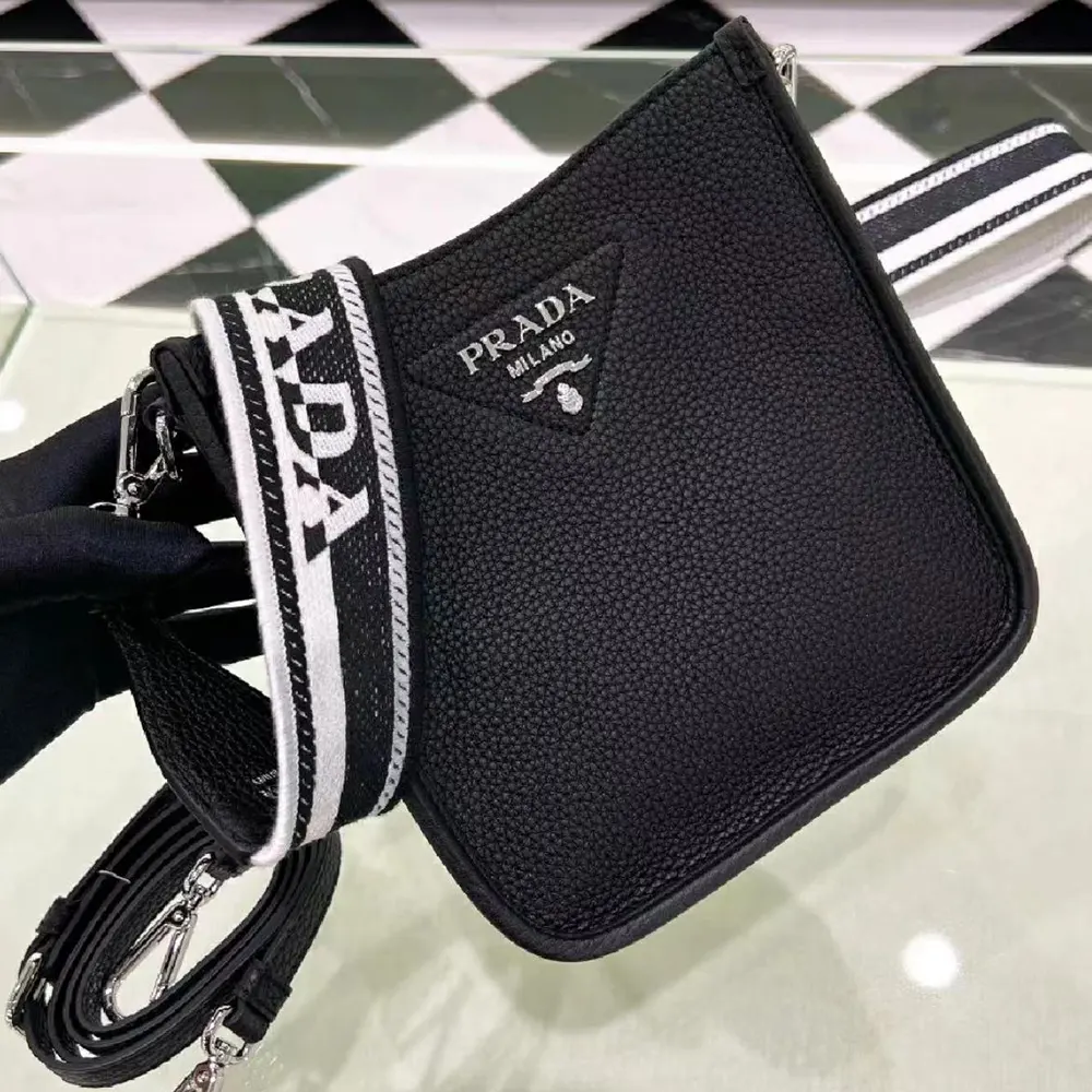 Side angle of Prada Unisex Leather Mini Shoulder Bag-Black with strap