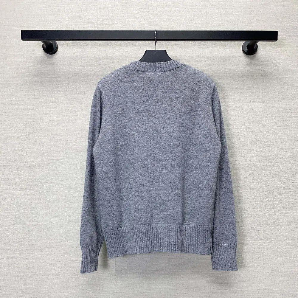 Side angle showing silhouette of Prada Men Cashmere and Wool Prada Logo Crew-neck Sweater-Silver