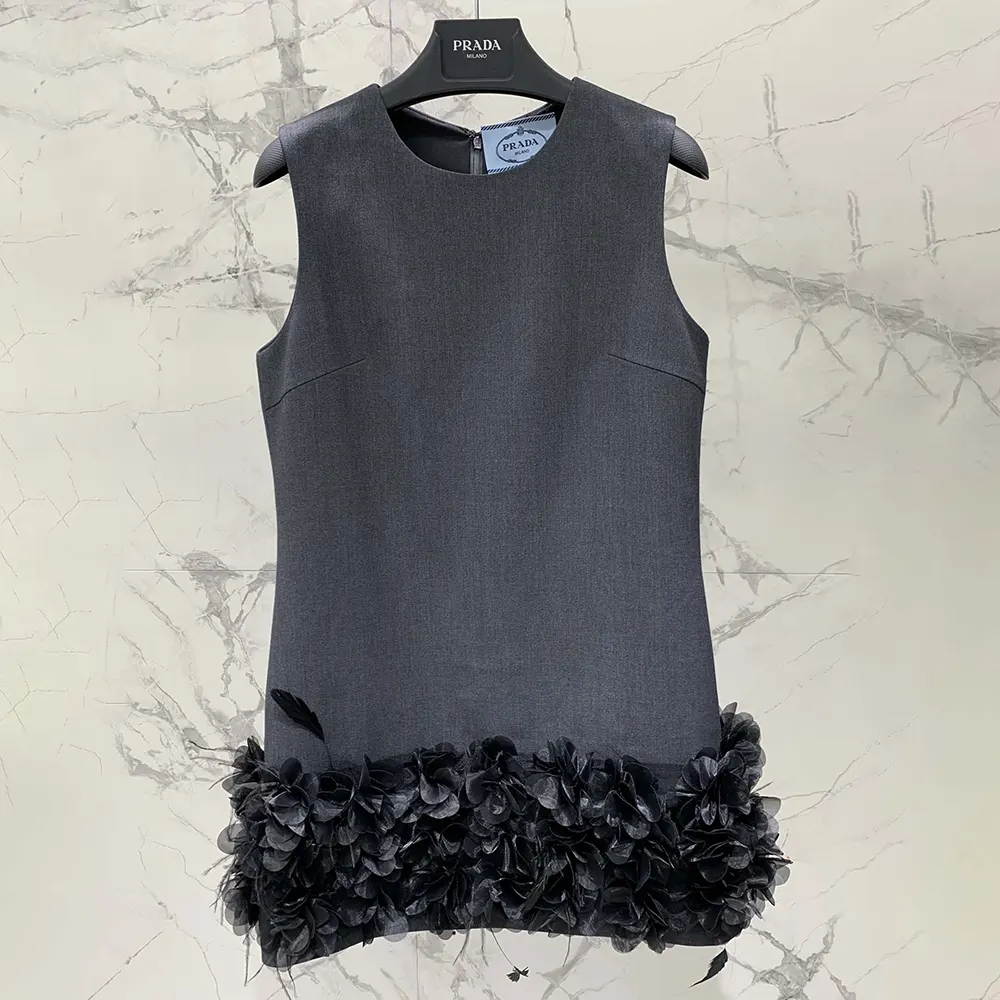Side profile showcasing silhouette and zipper on Prada Women Embroidered Wool Mini-dress
