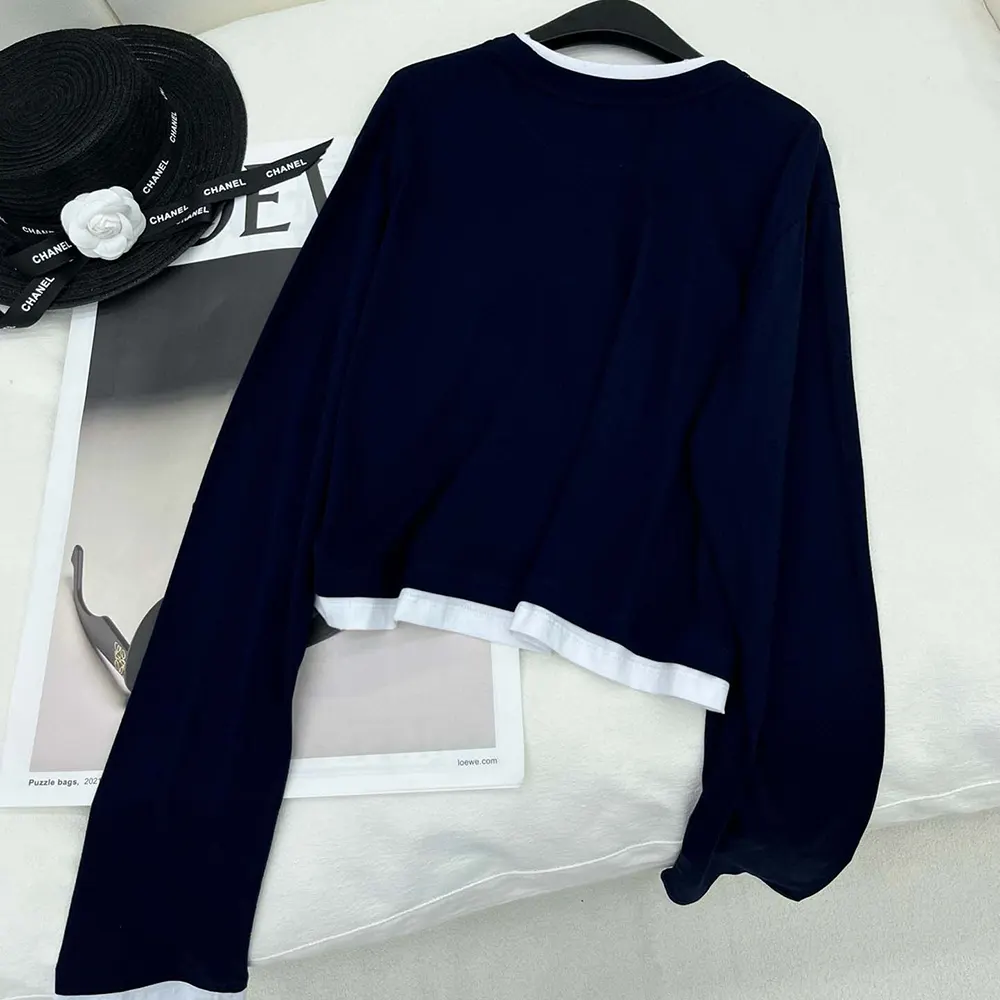 Side angle showing slim fit of Prada Women Long-sleeved Jersey T-shirt