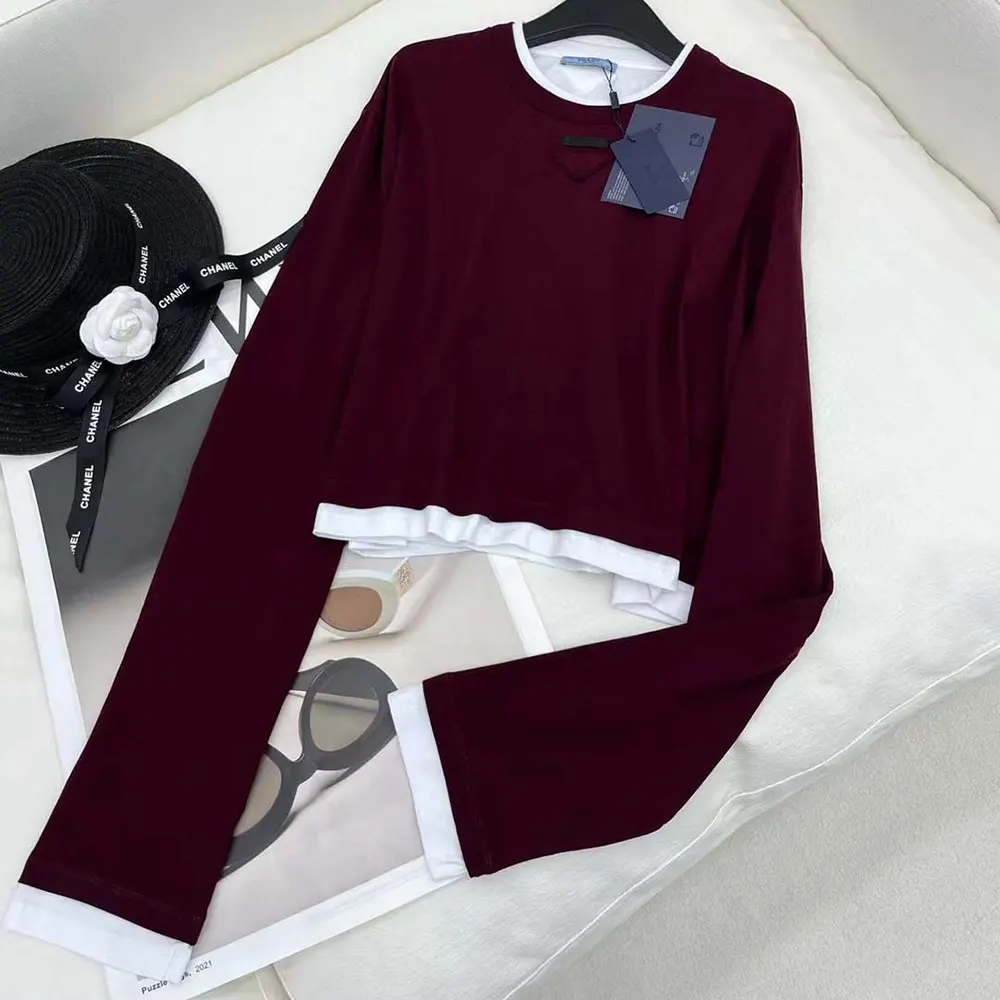 Side angle showcasing slim fit of Prada Women Long-sleeved Jersey T-shirt