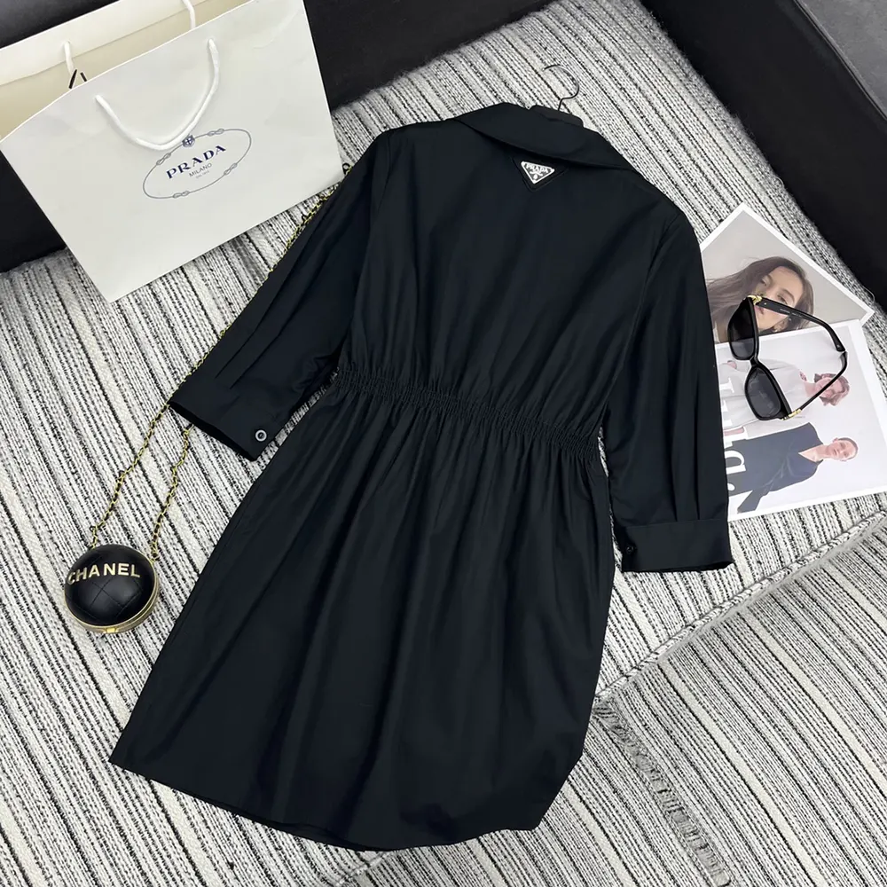 Side profile showing silhouette of Prada Women Poplin Mini-dress