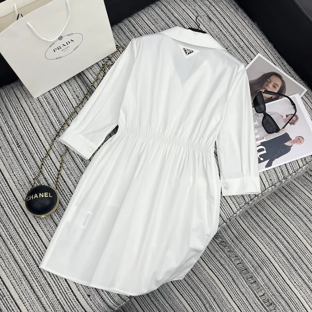 Side angle showing tailored silhouette of Prada Women Poplin Mini-dress