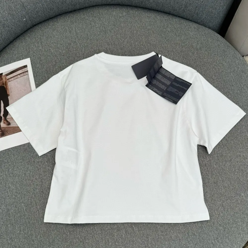 Side angle showing relaxed fit of Prada Women Printed Jersey T-shirt