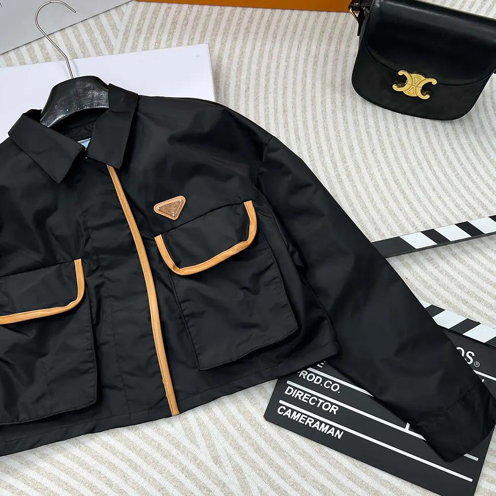 Side profile showing tailored silhouette of Prada Women Re-Nylon Jacket